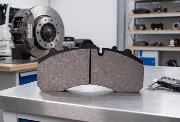DAF brake pad replacement checklist featuring disc brake pad on inspection table for commercial vehicle sourcing